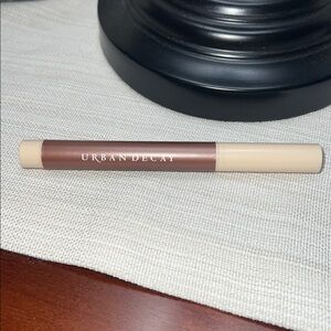 Urban Decay naked eyeshadow stick.